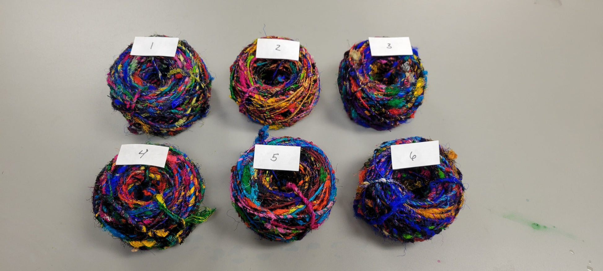 Reclaimed Silk Yarn. Art Yarn. 3.5 ounce. Hand-Spun Black and Rainbow. Recycled Yarn. 2nd Chance Fiber Yarn Bundle.