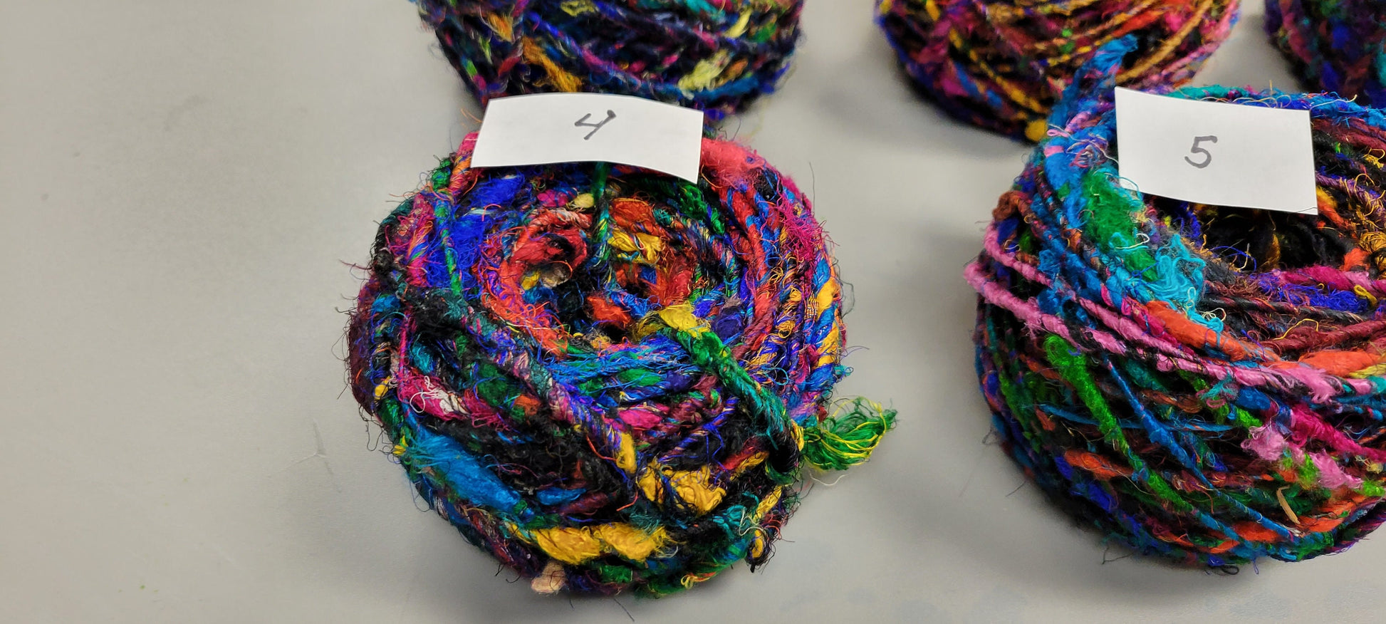 Reclaimed Silk Yarn. Art Yarn. 3.5 ounce. Hand-Spun Black and Rainbow. Recycled Yarn. 2nd Chance Fiber Yarn Bundle.