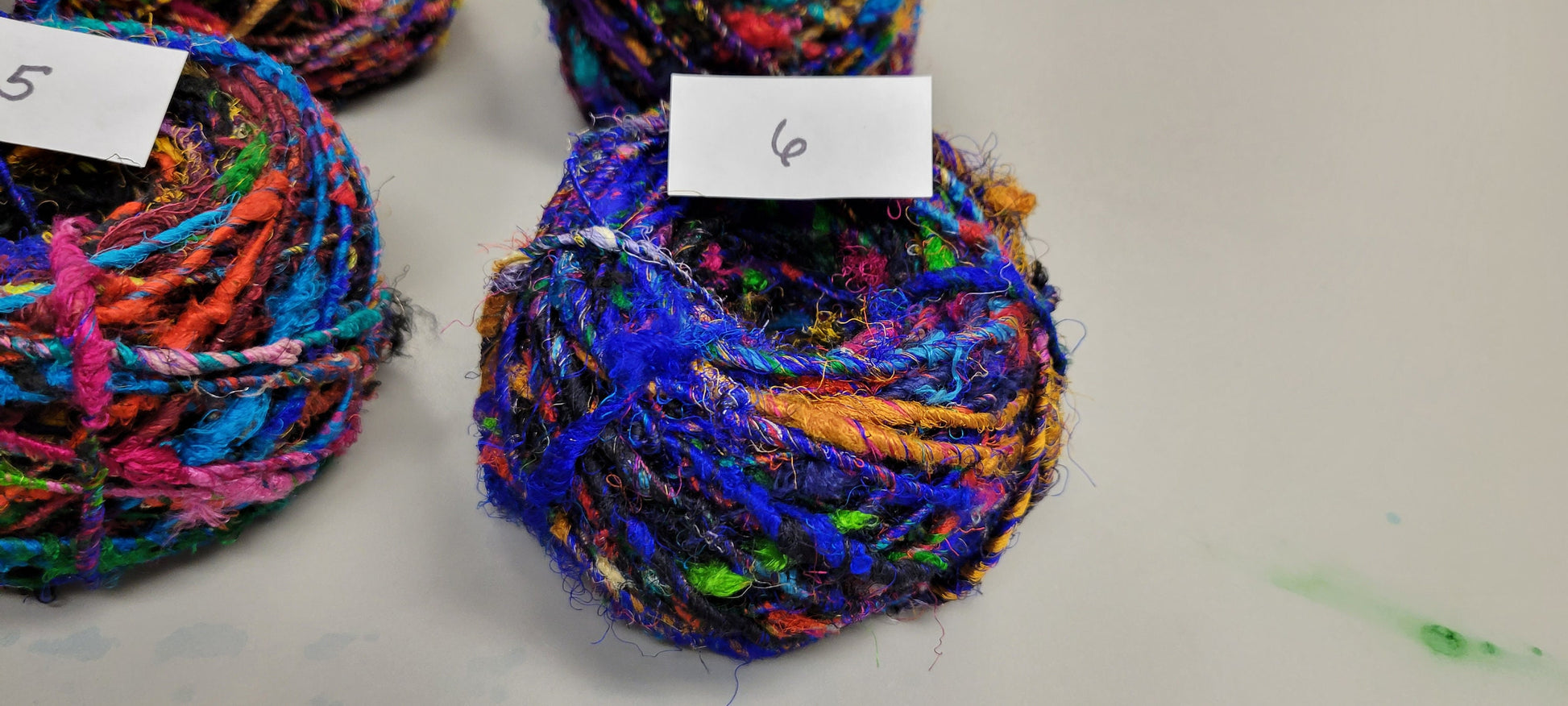 Reclaimed Silk Yarn. Art Yarn. 3.5 ounce. Hand-Spun Black and Rainbow. Recycled Yarn. 2nd Chance Fiber Yarn Bundle.