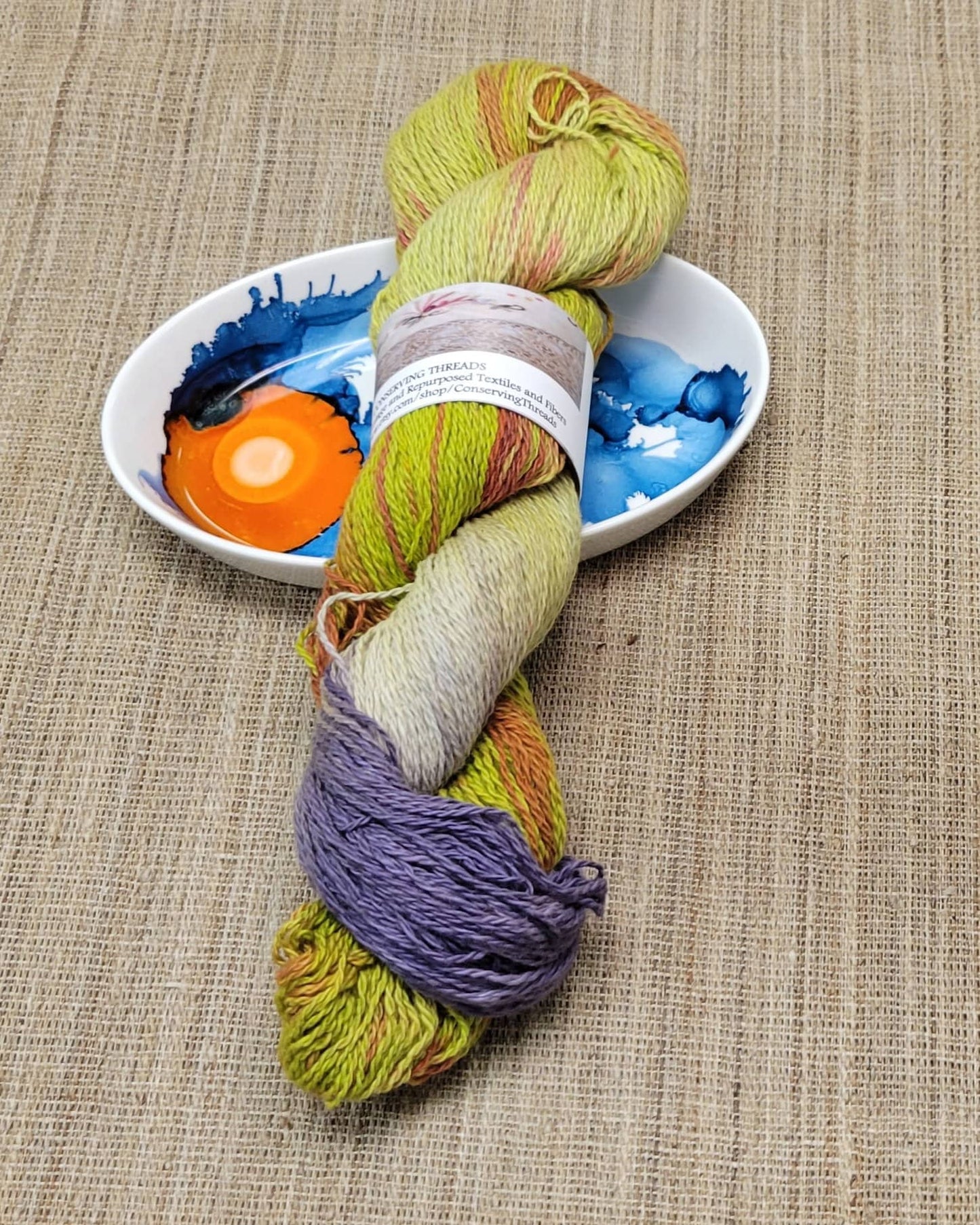 Dyed Cotton / Linen Blend Yarn. Purple, Orange and Green. Fingering Weight. Great for knitting, crochet, and weaving. Assigned Pooling.