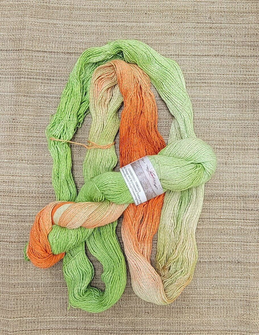 Dyed Cotton / Linen Blend Yarn. Green and Orange. Fingering Weight. Great for knitting, crochet, and weaving. Great for Assigned Pooling.