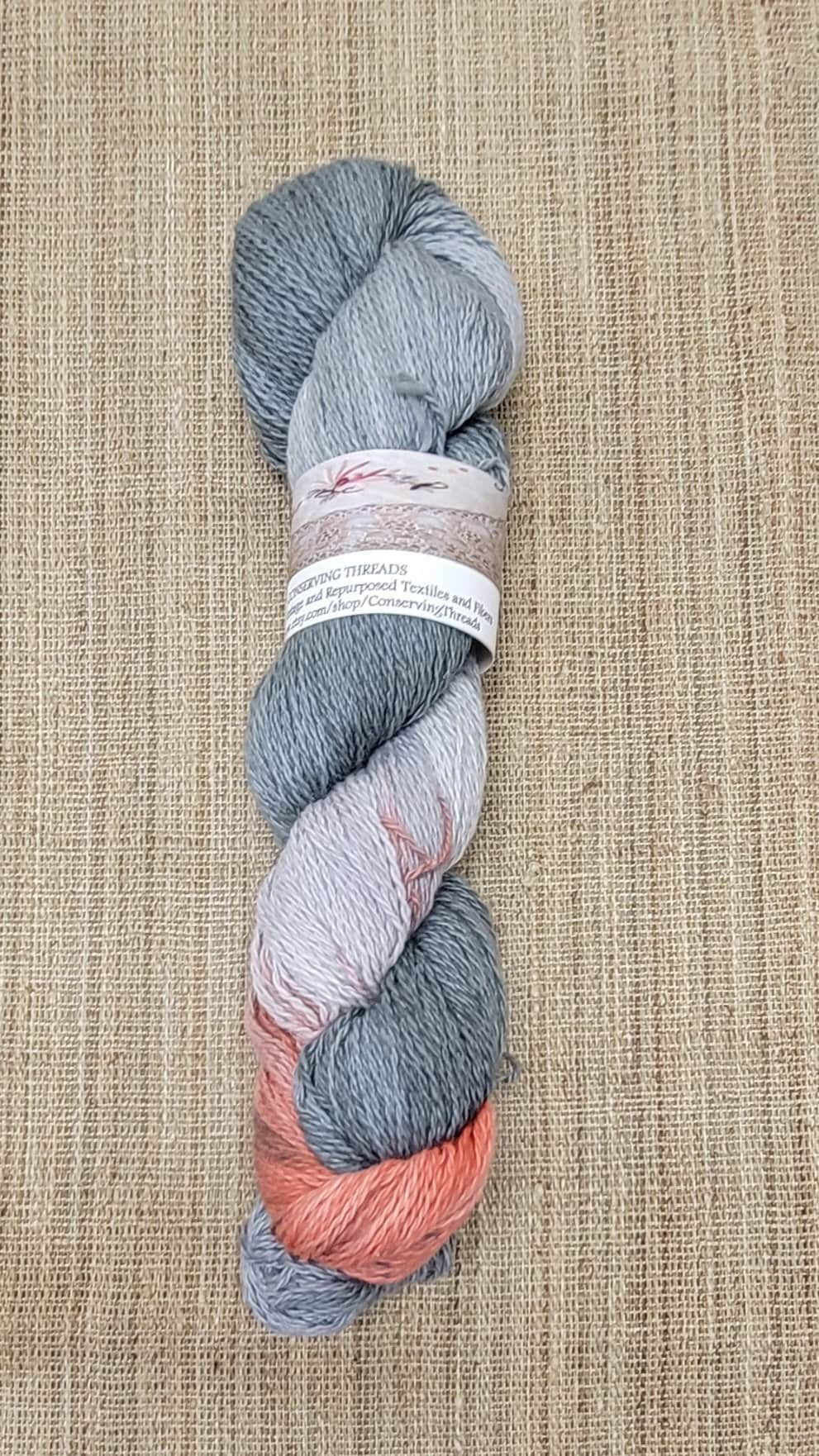 Dyed Cotton / Linen Blend Yarn. Gray and Red. Fingering Weight. Great for knitting, crochet, and weaving. Assigned Pooling.