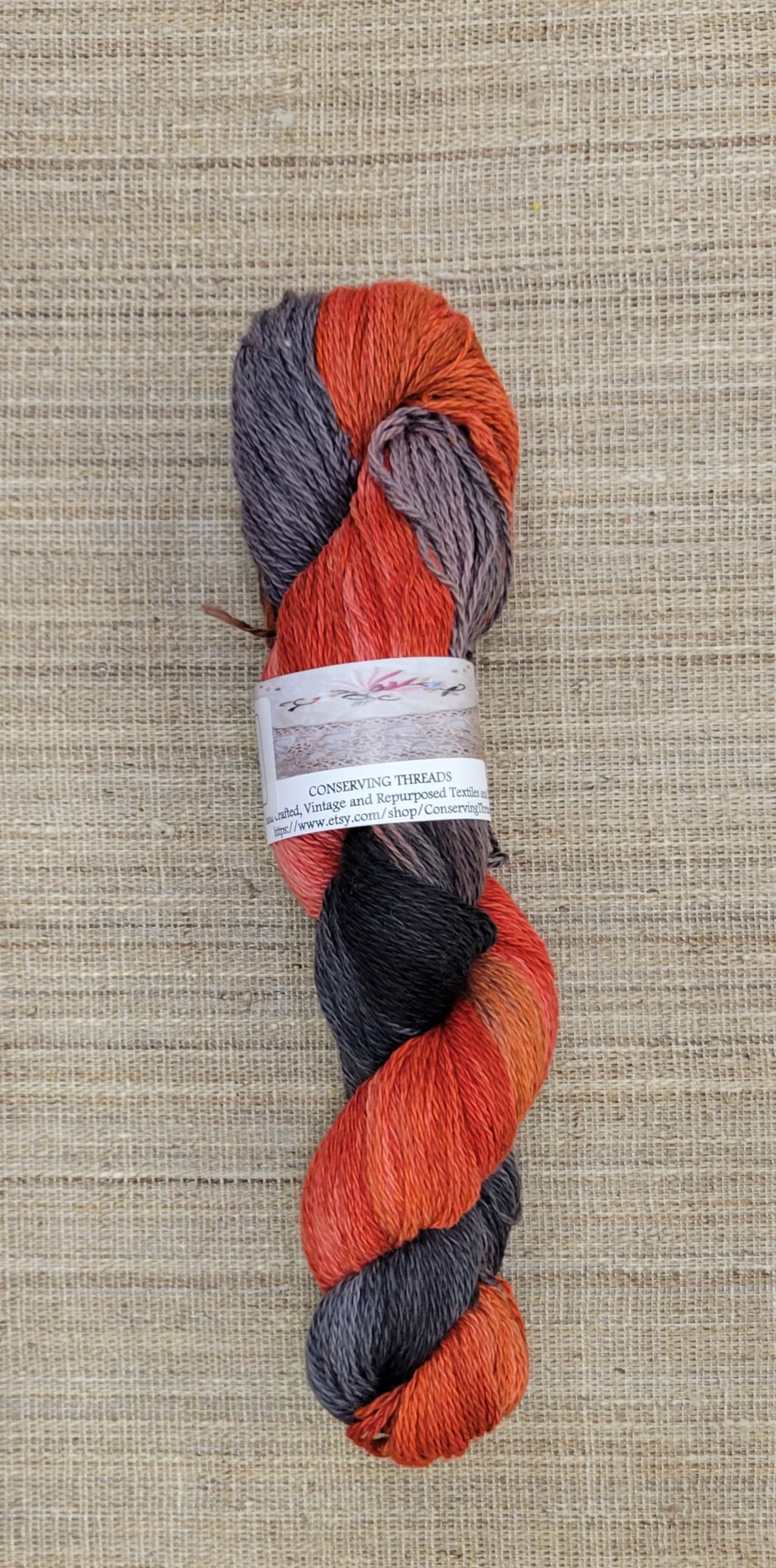 Dyed Cotton / Linen Blend Yarn. Red and Black. Fingering Weight. Great for knitting, crochet, and weaving. Assigned Pooling.