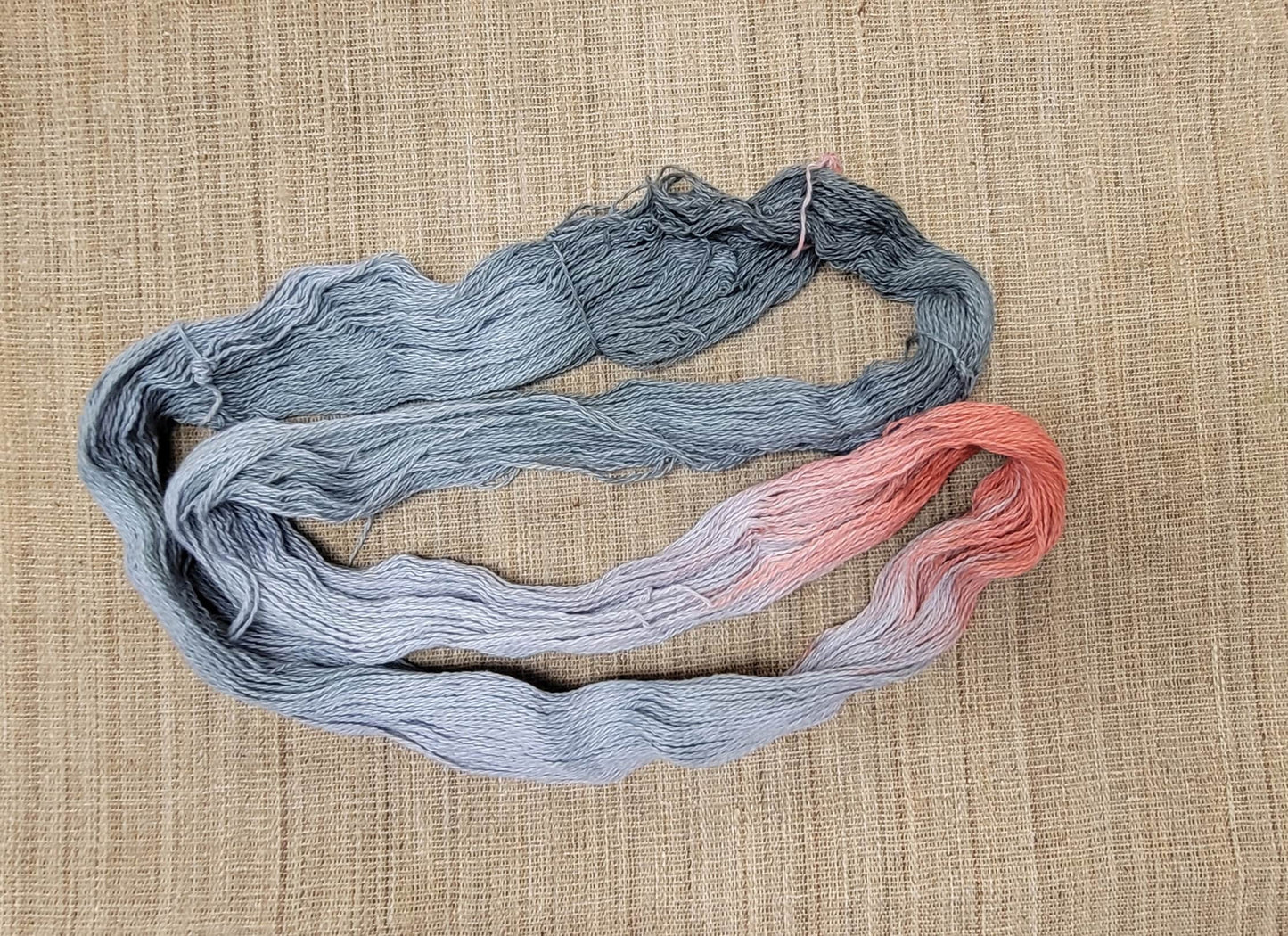 Dyed Cotton / Linen Blend Yarn. Gray and Red. Fingering Weight. Great for knitting, crochet, and weaving. Assigned Pooling.