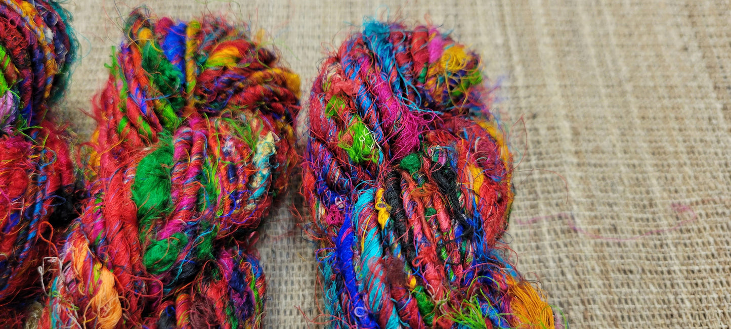 Reclaimed Silk Yarn. Art Yarn. 3.5 ounce. Hand-Spun Black and Rainbow. Recycled Yarn. 2nd Chance Fiber Yarn Bundle. Red.