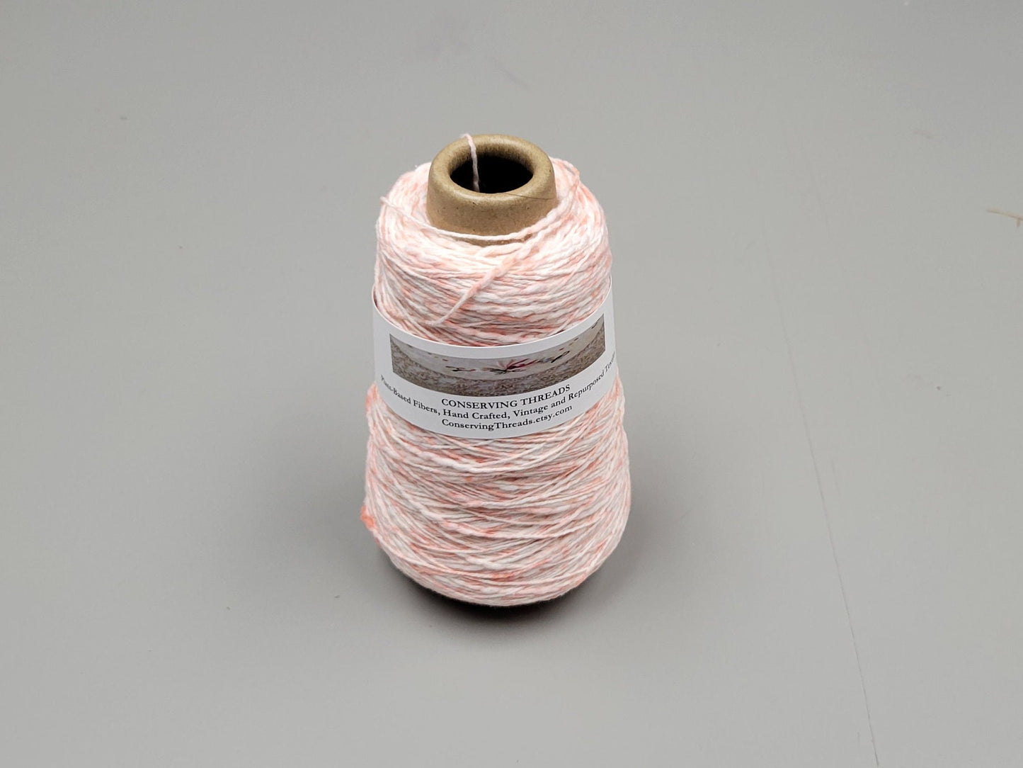 Cotton Yarn Splatter Light Red and White, Hand Spun, 2 Ply Fingering Weight on Cone. Great for Knitting, Crochet, Weaving, Big Stitching