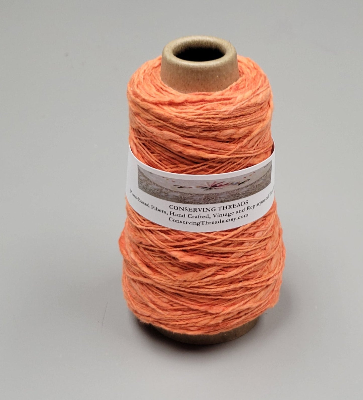 Cotton Yarn Orange, Hand Spun, 2 Ply Fingering Weight on Cone.