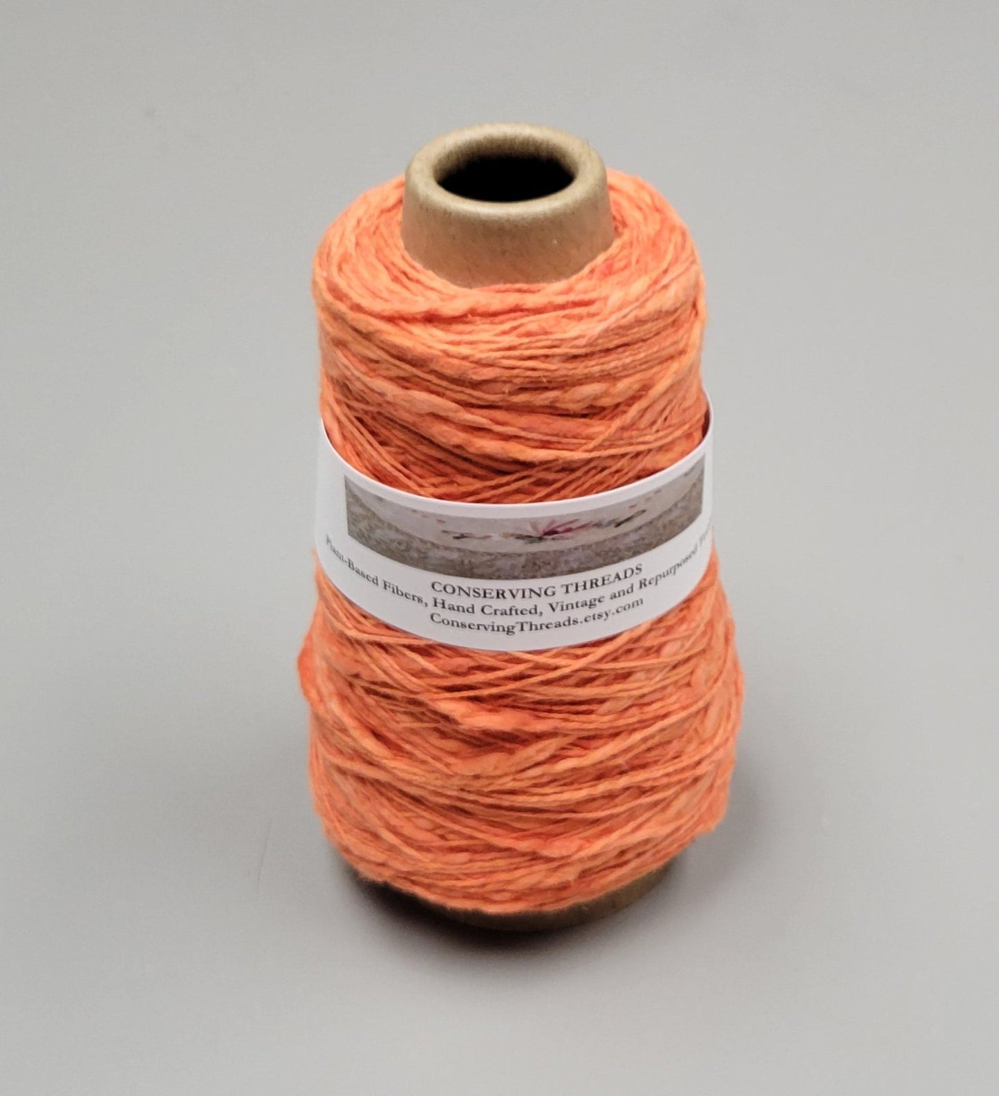 Cotton Yarn Orange, Hand Spun, 2 Ply Fingering Weight on Cone.